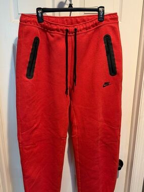 Nike Tech Red Joggers with Black Accents